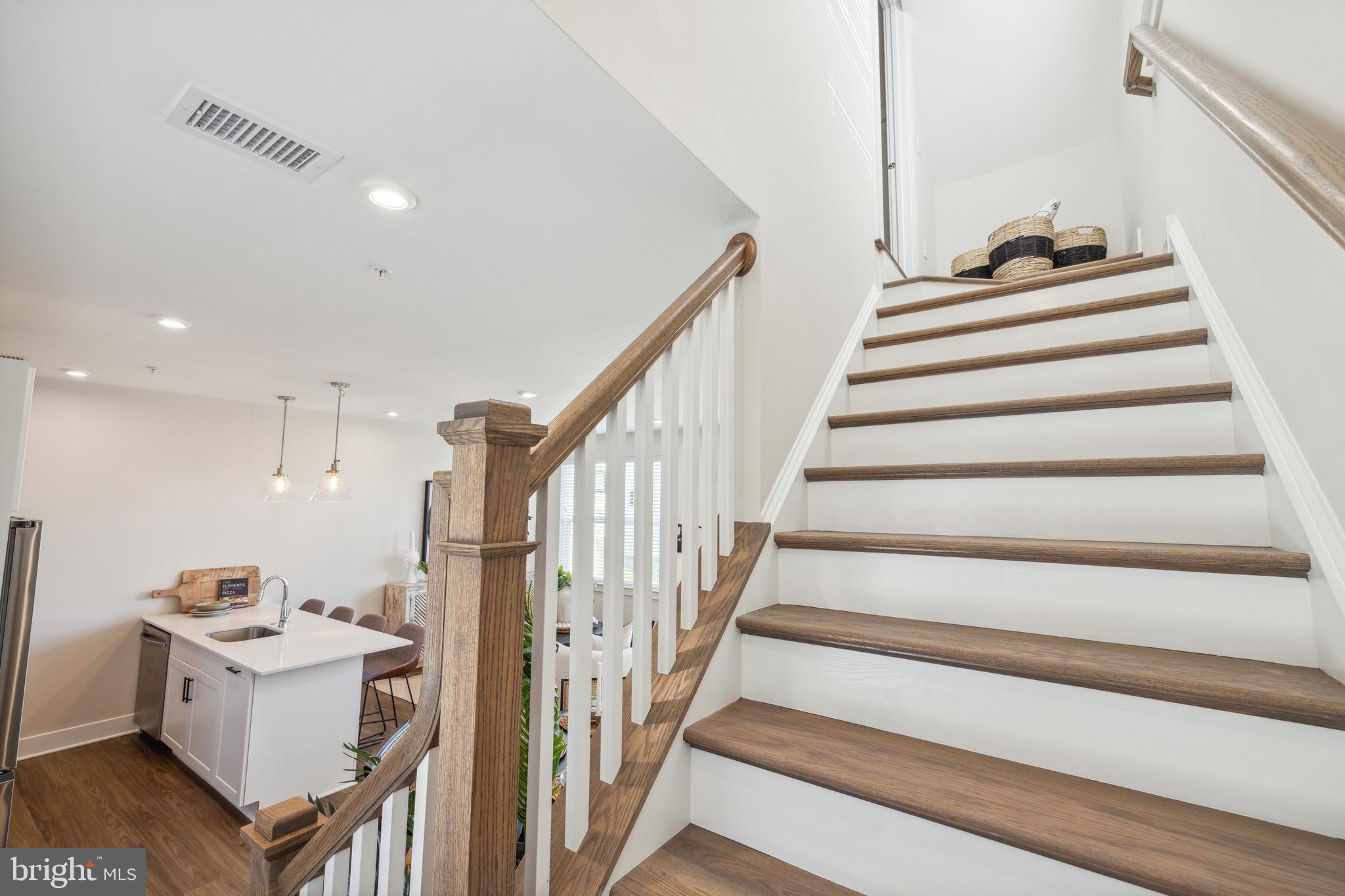 17 Mainland Road, Unit 216 Harleysville, PA 19438 - Photo 14 of 23 a view of entryway and hall with wooden floor