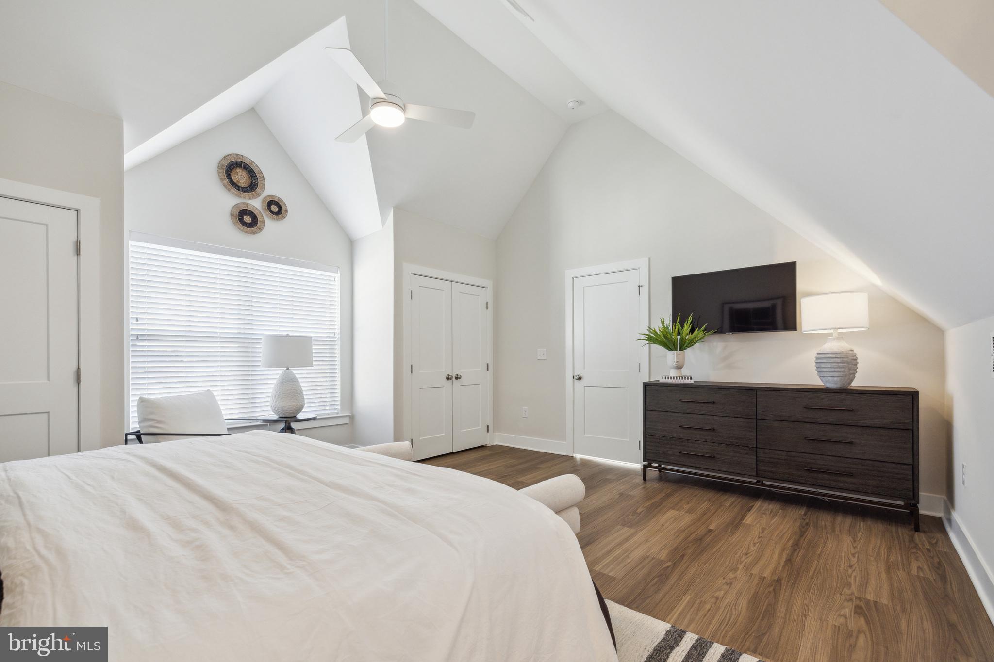 17 Mainland Road, Unit 216 Harleysville, PA 19438 - Photo 19 of 23 a bedroom with a bed and flat screen tv