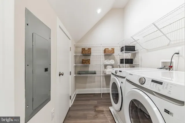 a spacious bathroom with a granite countertop sink mirror and toilet