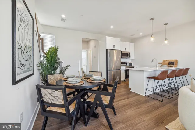 a kitchen with sink and cabinets