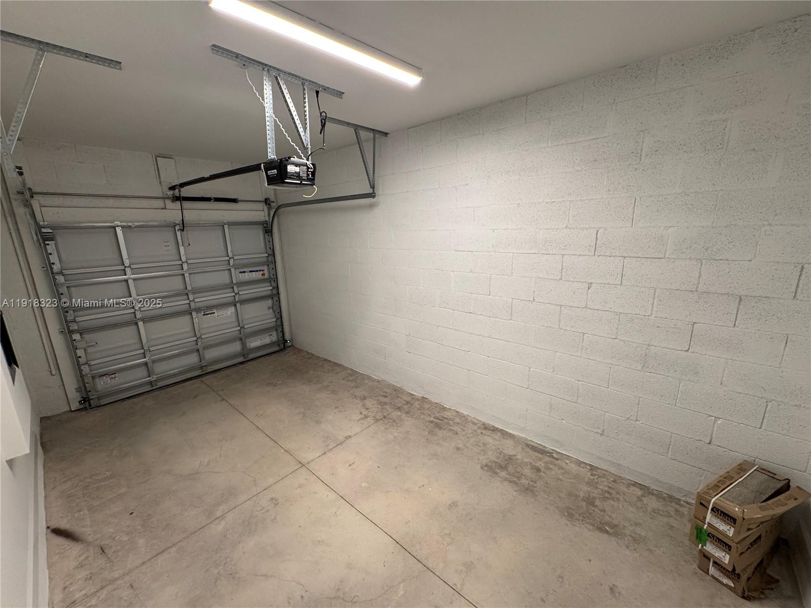 5726 Divine Drive, Unit 5726 Delray Beach, FL 33484 - Photo 15 of 44 a view of a garage