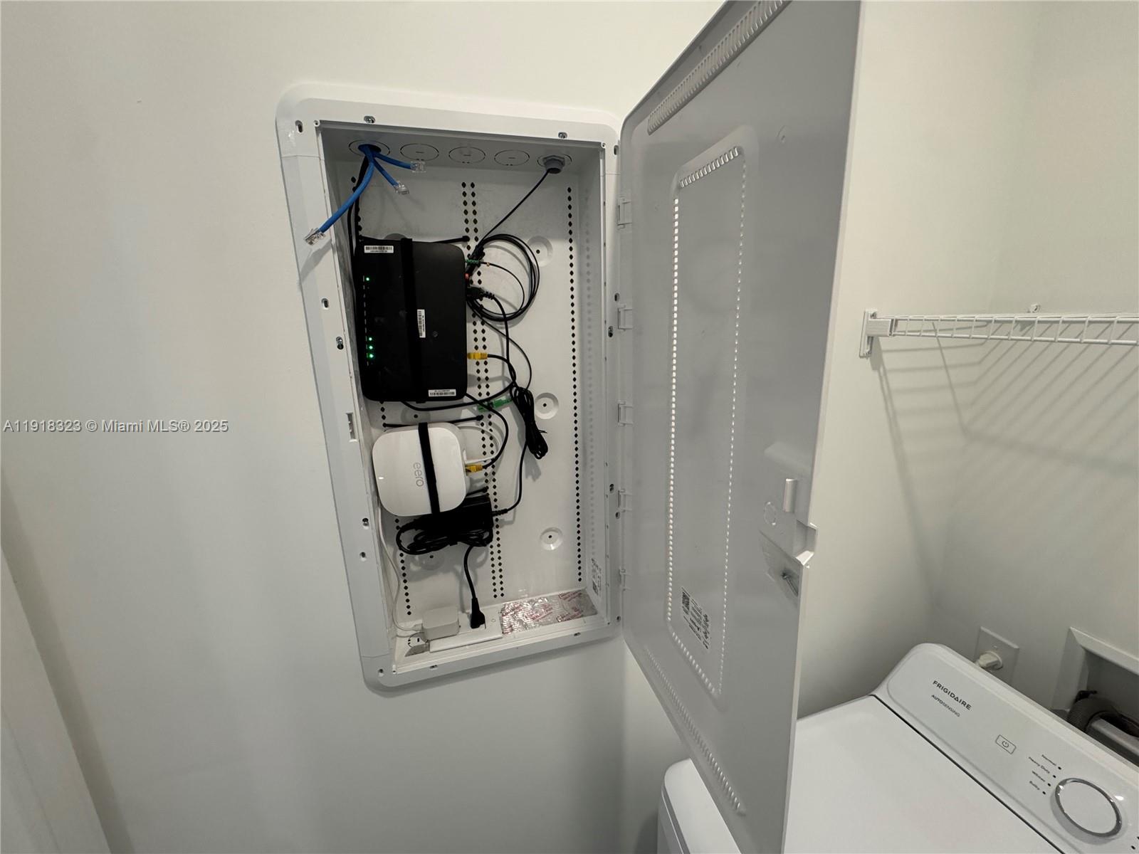 5726 Divine Drive, Unit 5726 Delray Beach, FL 33484 - Photo 22 of 44 a view of storage and utility room with utility room