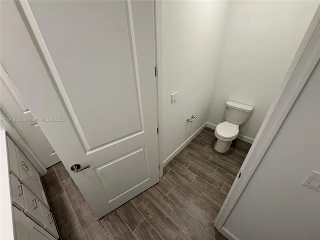 a bathroom with a shower and a sink