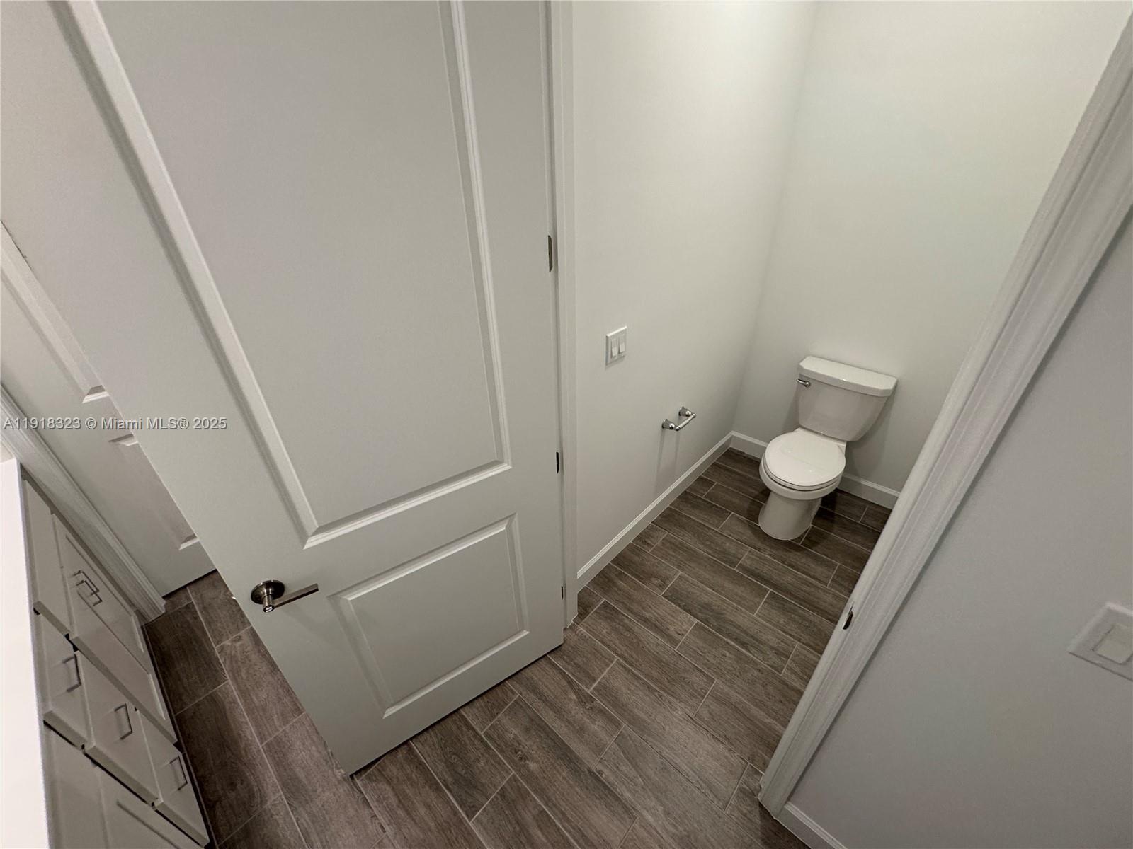 5726 Divine Drive, Unit 5726 Delray Beach, FL 33484 - Photo 29 of 44 a bathroom with a sink and a toilet