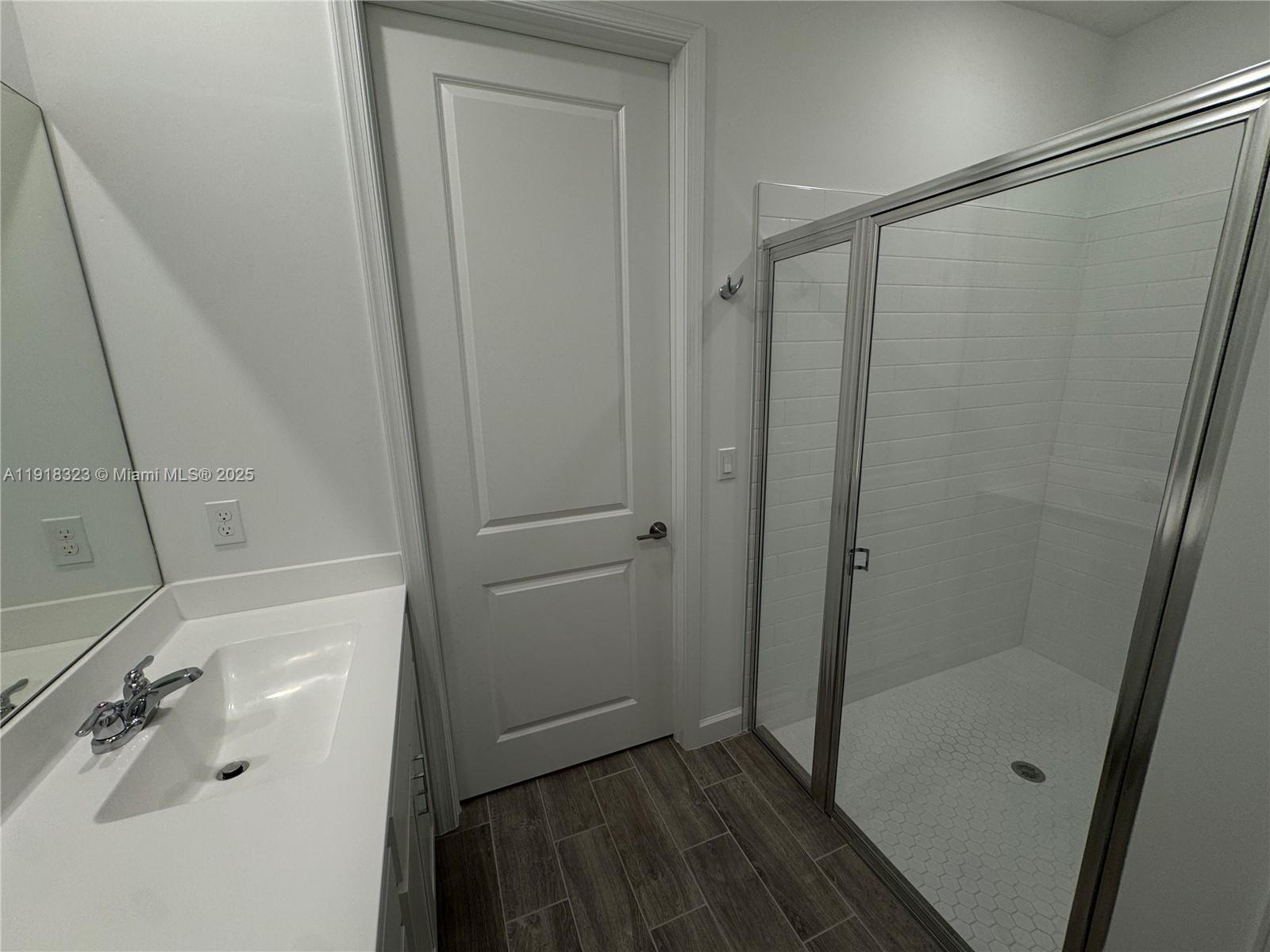 5726 Divine Drive, Unit 5726 Delray Beach, FL 33484 - Photo 34 of 44 a bathroom with a shower