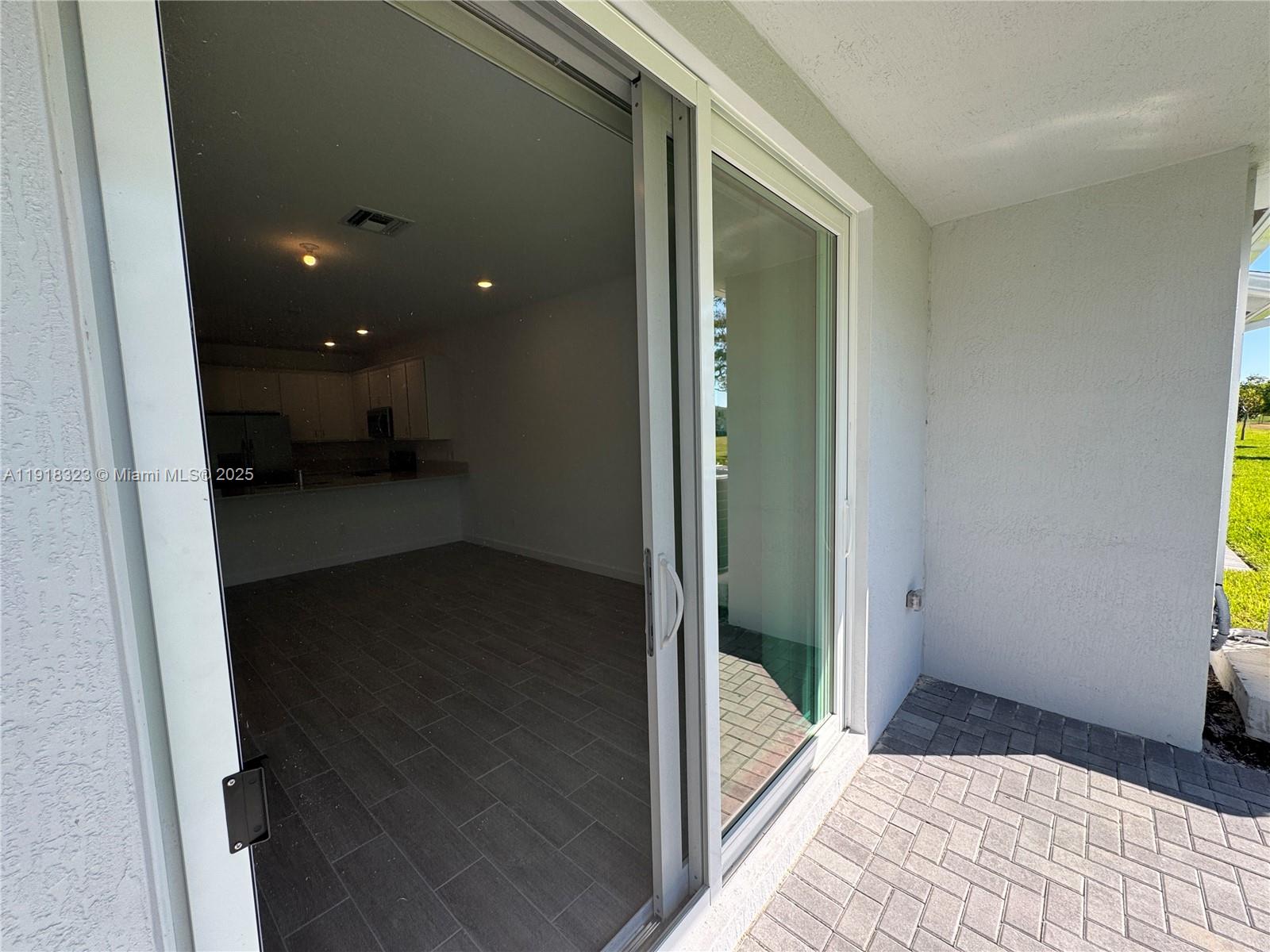 5726 Divine Drive, Unit 5726 Delray Beach, FL 33484 - Photo 40 of 44 a view of entryway