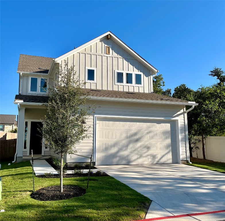 320 Creek Road, Unit 305 Dripping Springs, TX 78620 - Photo 1 of 1 a front view of a house with a yard