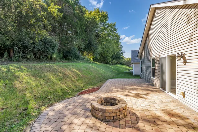 a view of a back yard of the house