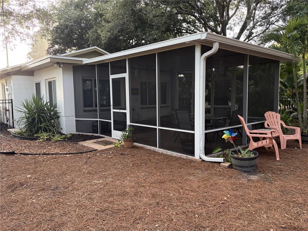 421 Riviera Street Venice, FL 34285 - Photo 24 of 30 a view of backyard with outdoor space and porch