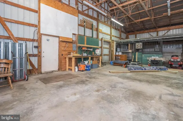 a view of a building with sitting area