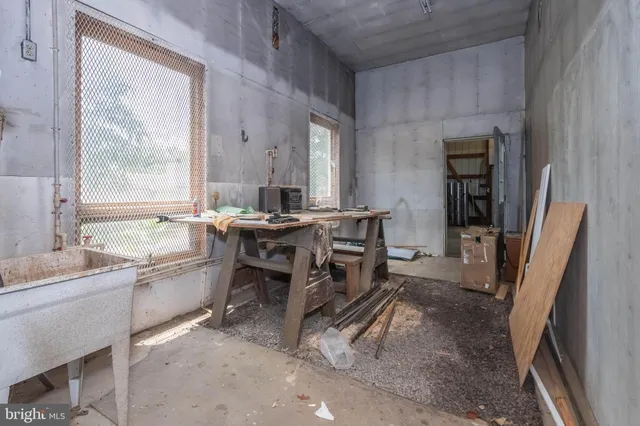 a room with furniture a window and a glass door