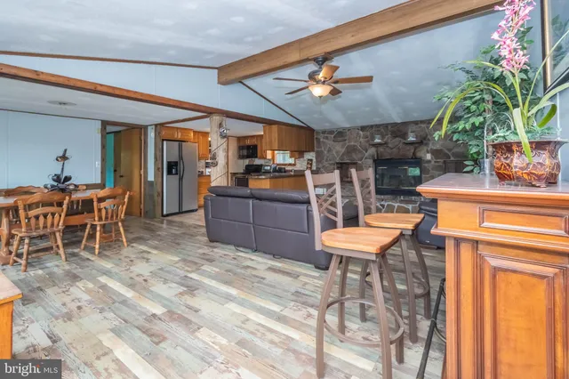 a room with furniture and pool table