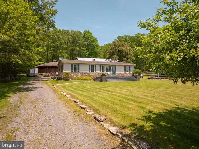 a view of a house with swimming pool