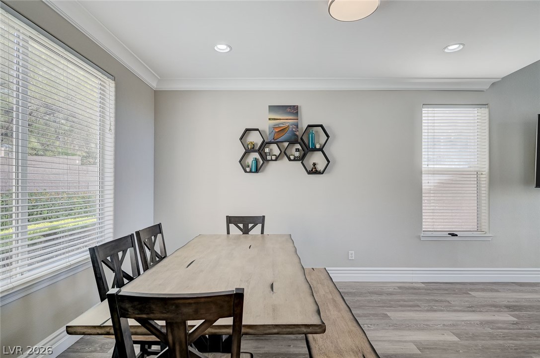 2391 Rainswept Avenue Henderson, NV 89052 - Photo 26 of 62 This bright dining area features ample natural light and durable flooring, perfect for gatherings.