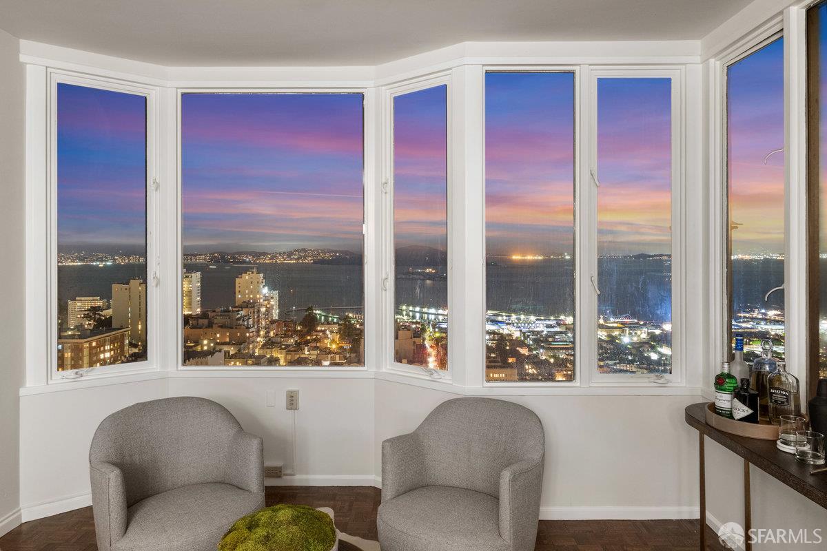1101 Green Street, Unit 1801 San Francisco, CA 94109 - Photo 15 of 45 a living room with furniture and a window