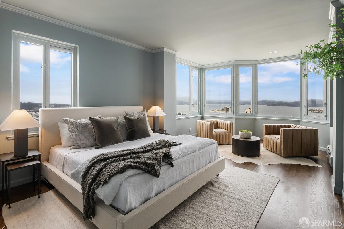 1101 Green Street, Unit 1801 San Francisco, CA 94109 - Photo 18 of 45 a large bedroom with bed and large window