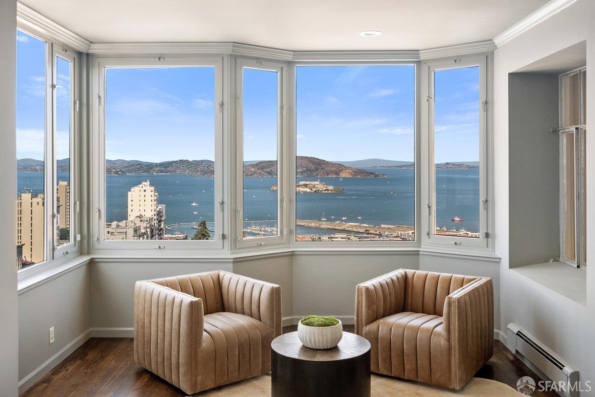 1101 Green Street, Unit 1801 San Francisco, CA 94109 - Photo 19 of 45 a living room with furniture and a large window