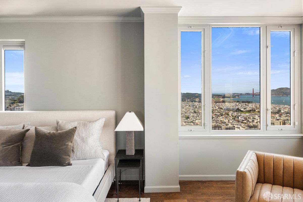 1101 Green Street, Unit 1801 San Francisco, CA 94109 - Photo 21 of 45 a living room with furniture and a window