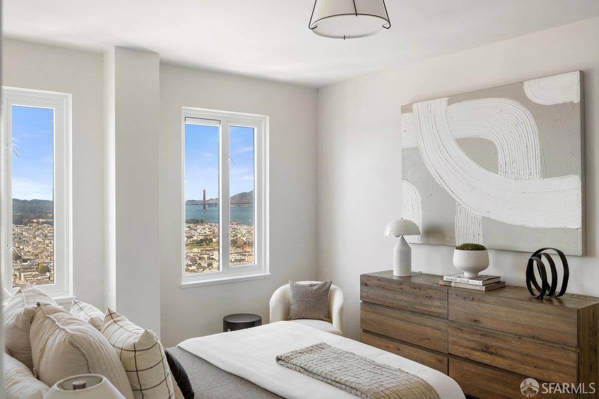 1101 Green Street, Unit 1801 San Francisco, CA 94109 - Photo 25 of 45 a living room with furniture and window
