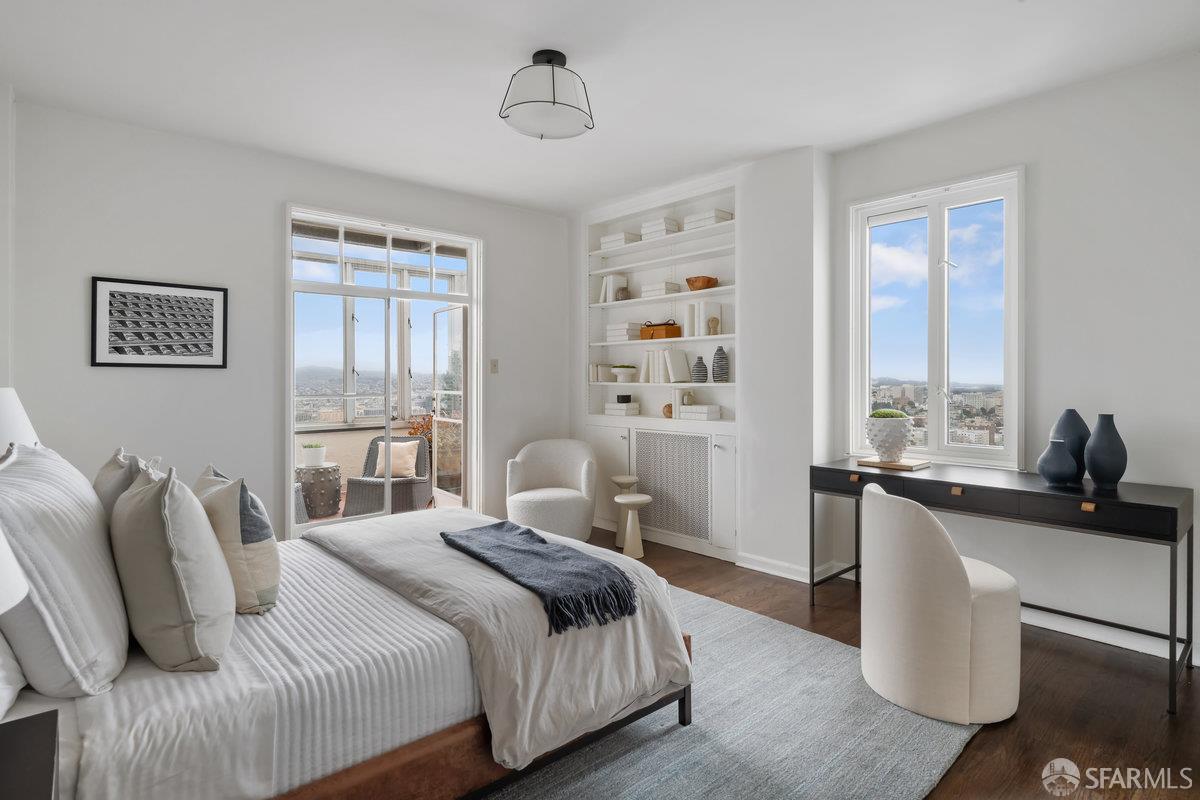 1101 Green Street, Unit 1801 San Francisco, CA 94109 - Photo 26 of 45 a bedroom with a large bed and a window