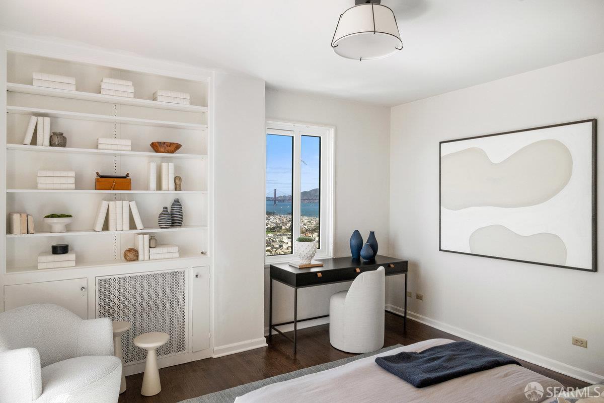1101 Green Street, Unit 1801 San Francisco, CA 94109 - Photo 27 of 45 a living room with furniture and a window