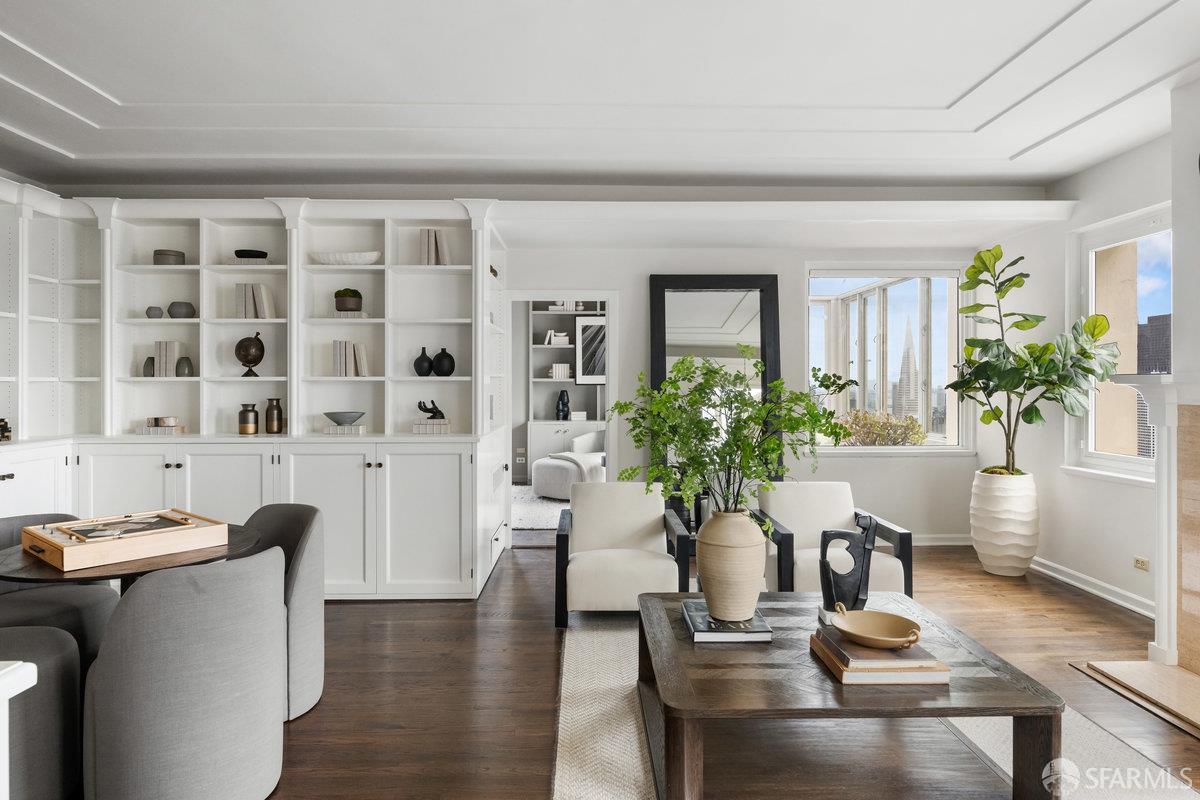 1101 Green Street, Unit 1801 San Francisco, CA 94109 - Photo 35 of 45 a dining room with furniture and wooden floor