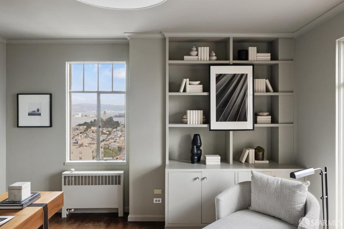 1101 Green Street, Unit 1801 San Francisco, CA 94109 - Photo 39 of 45 a living room with furniture and a window