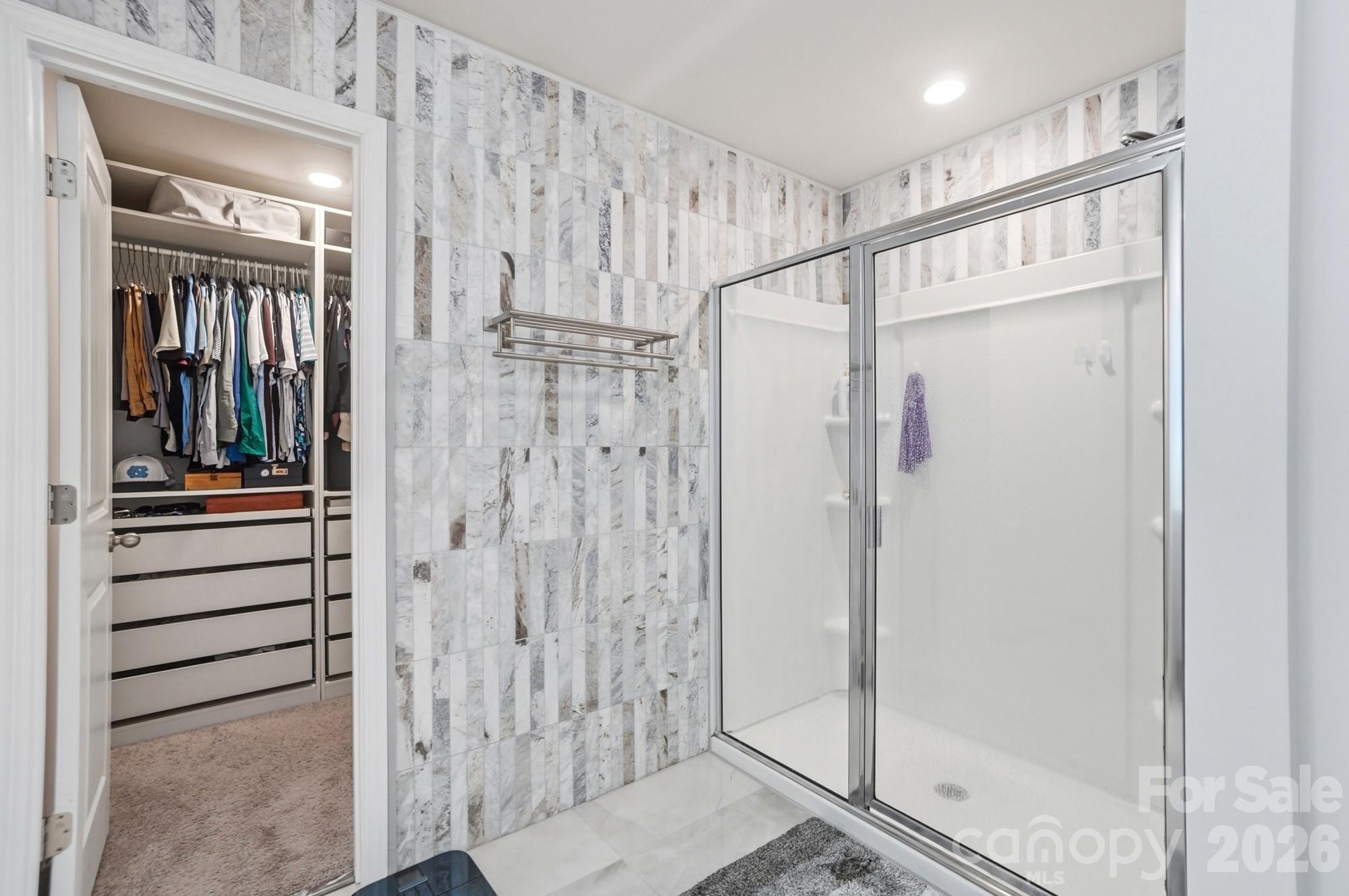 116 Timbergreen Court Troutman, NC 28166 - Photo 25 of 43 a bathroom with a shower and a sink