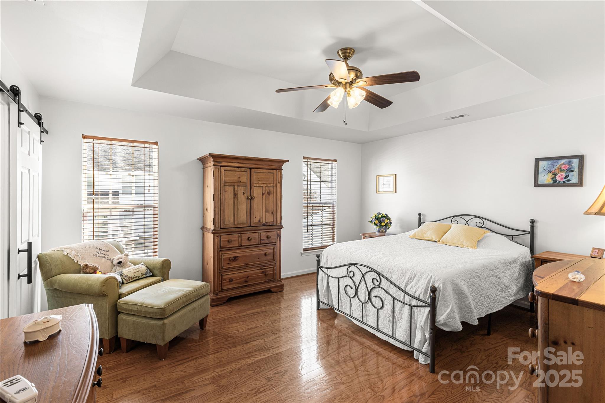 324 Dusk Drive Rock Hill, SC 29732 - Photo 20 of 39 a bedroom with a bed couch and a window