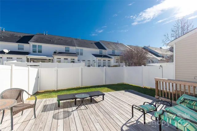 a view of a chairs and table on the terrace