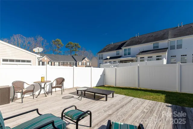 a backyard of a house with seating space