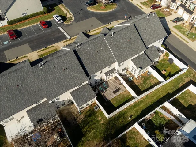 an aerial view of residential house with outdoor space