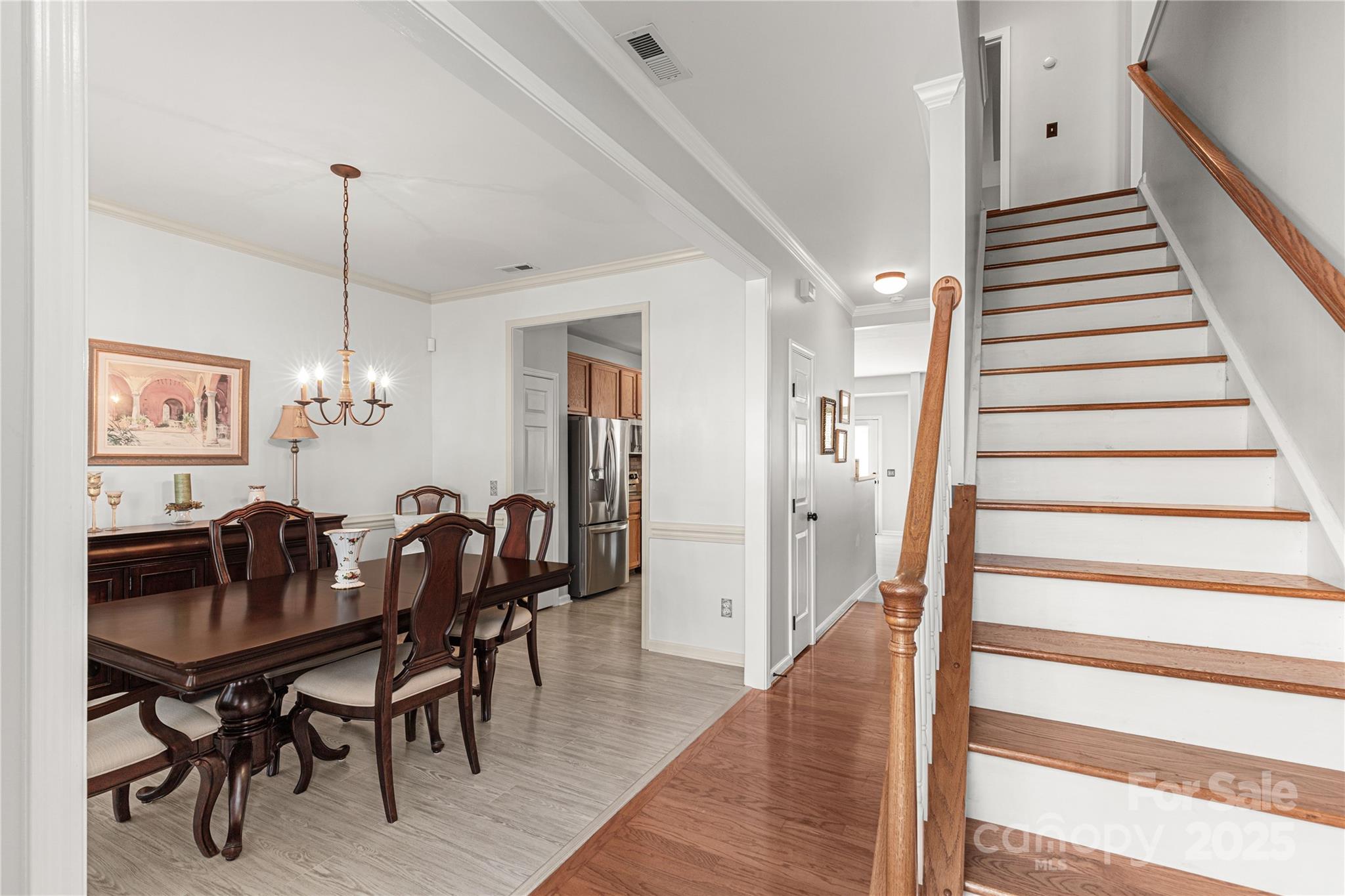 324 Dusk Drive Rock Hill, SC 29732 - Photo 5 of 39 a view of a dining room with furniture and wooden floor