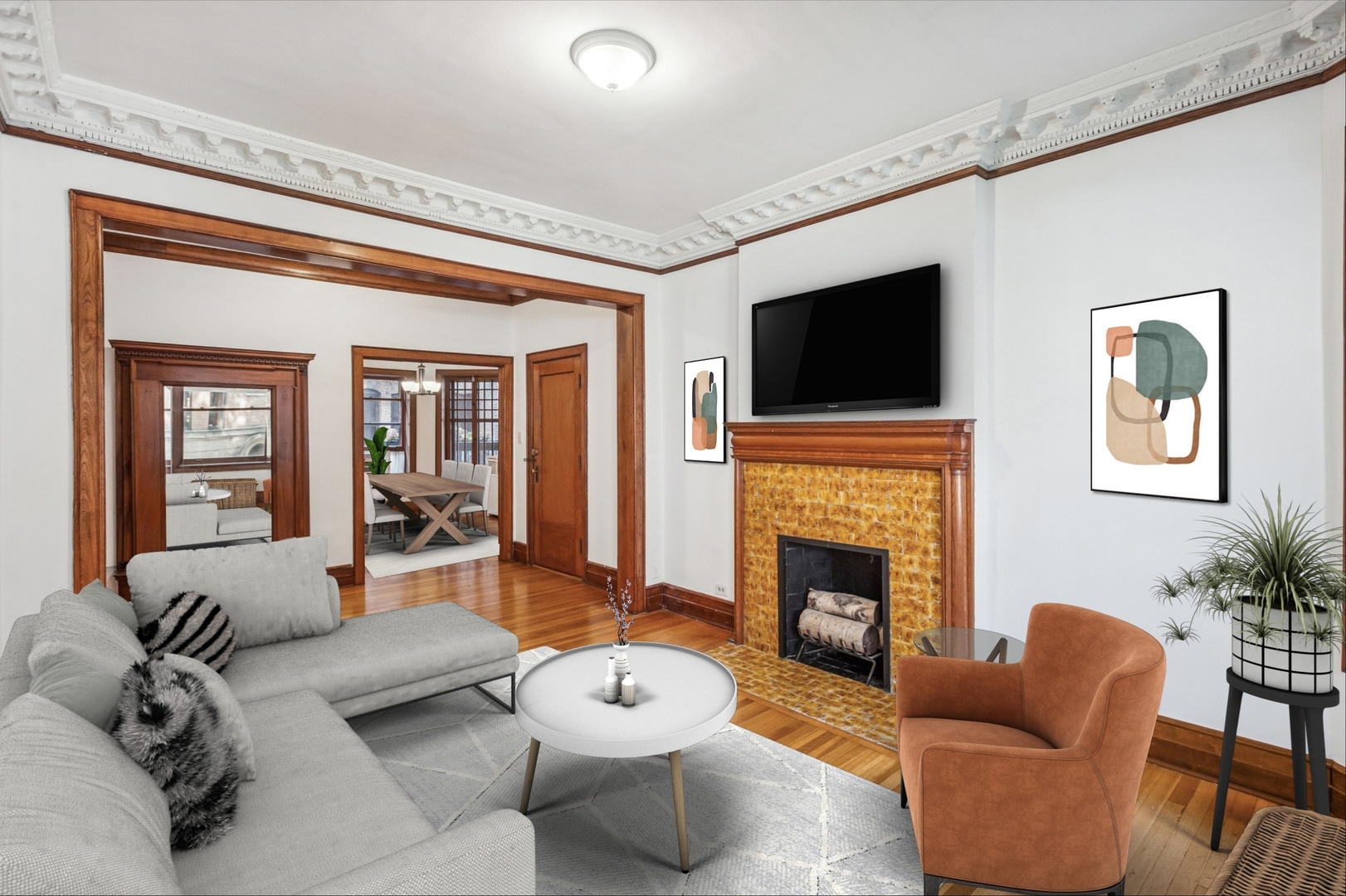 672 West Irving Park Road, Unit G2 Chicago, IL 60613 - Photo 4 of 25 a living room with furniture fireplace and flat screen tv