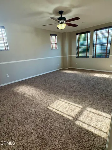 a view of an empty walk in closet