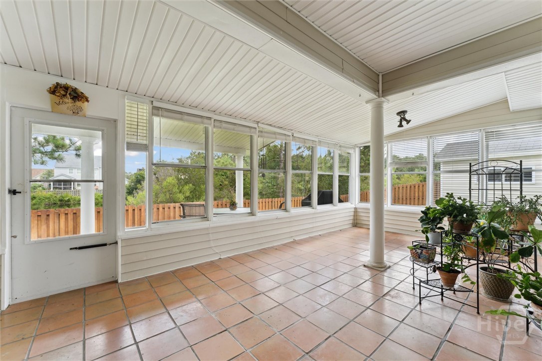 7 River Rock Road Savannah, GA 31419 - Photo 8 of 16 Custom Sunroom with Lagoon Views