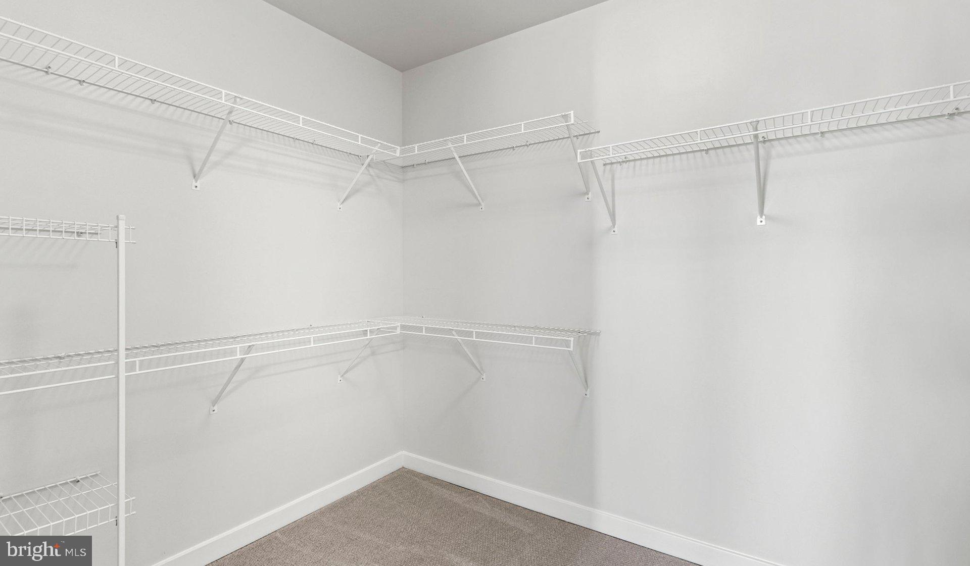8300 Wisconsin Avenue, Unit 0B1313 Bethesda, MD 20814 - Photo 133 of 150 a view of a room with racks on the wall