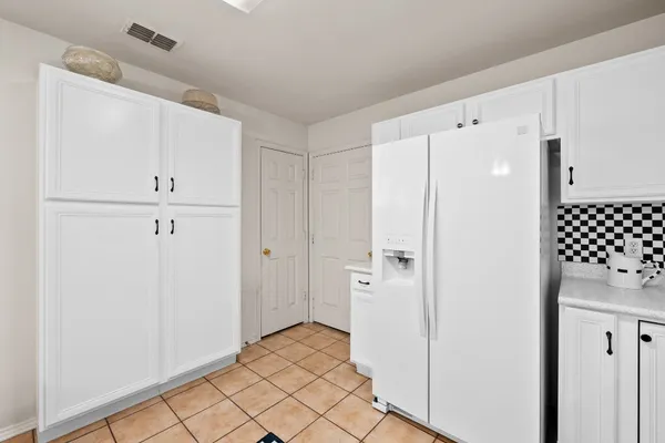 a view of a hallway with closet area