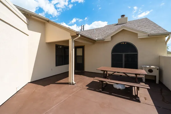 a building outdoor space with patio furniture