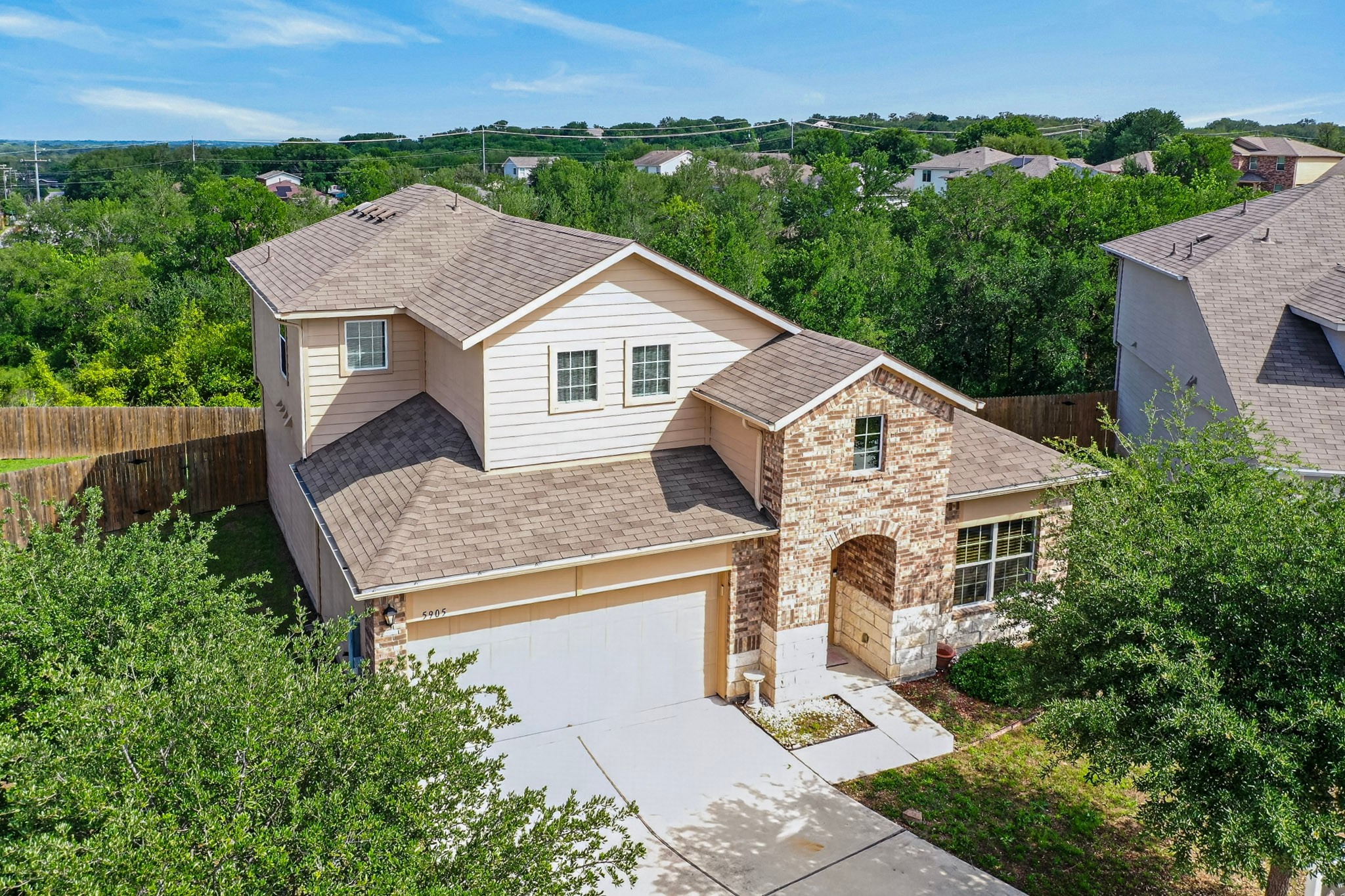 5905 Diamondleaf Bend Austin, TX 78724 - Photo 38 of 38 Two-story residence featuring a combination of siding and stone veneer
