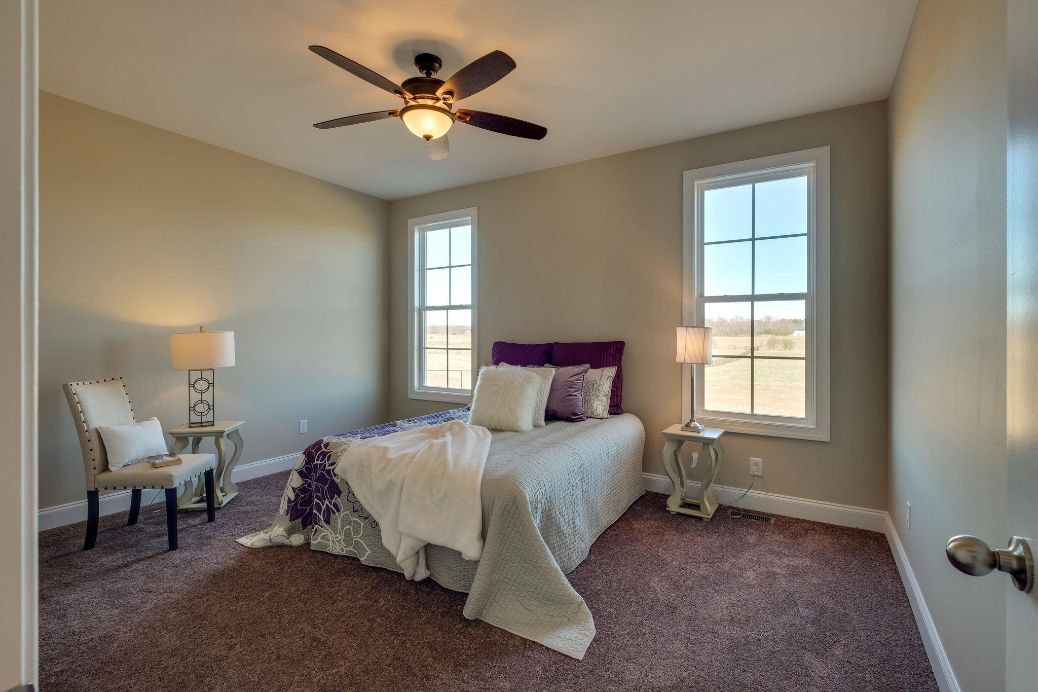 1809 Abiff Road Burns, TN 37029 - Photo 17 of 28 a bedroom with a bed and a window