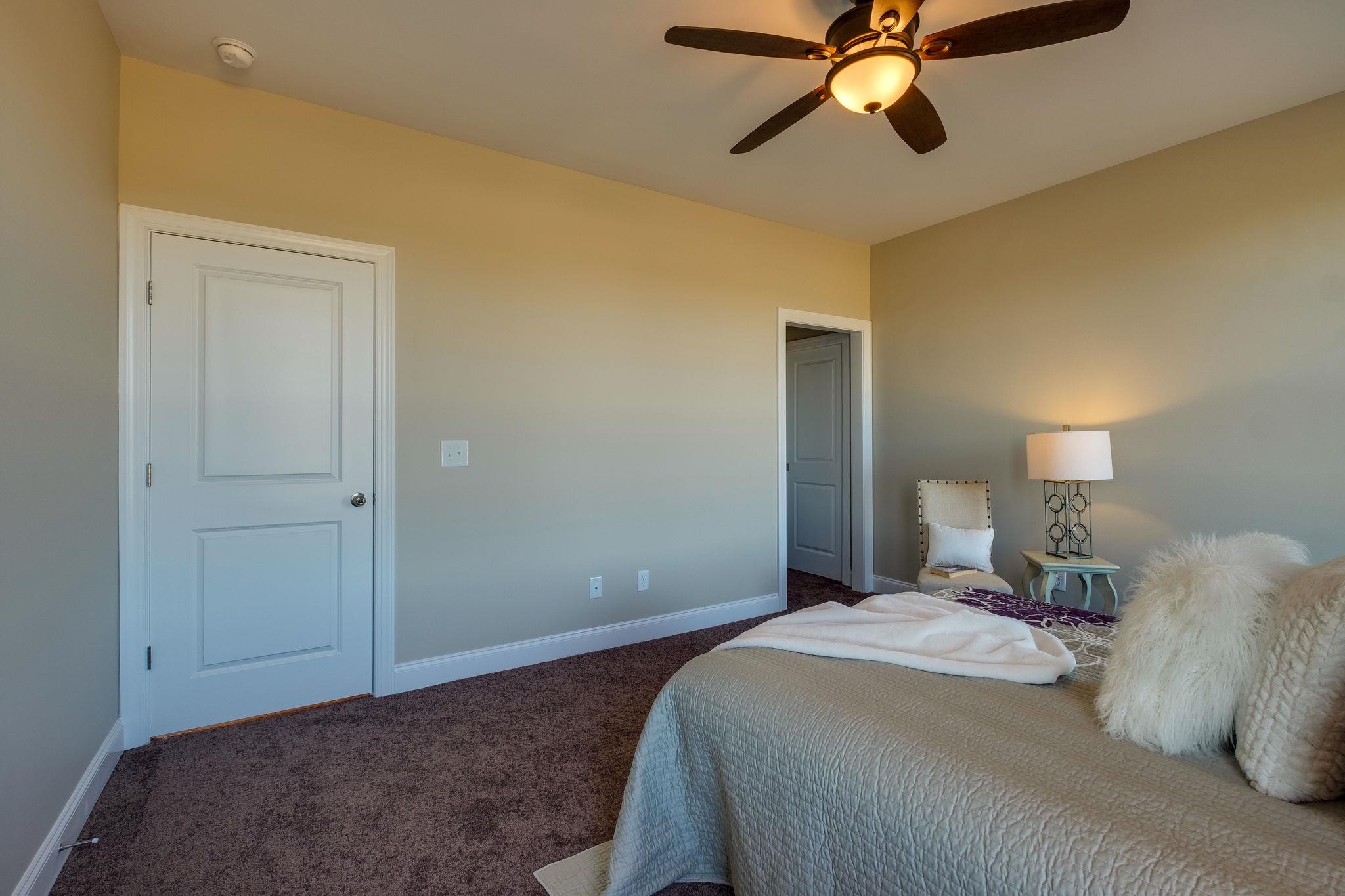1809 Abiff Road Burns, TN 37029 - Photo 18 of 28 a bedroom with a bed and closet
