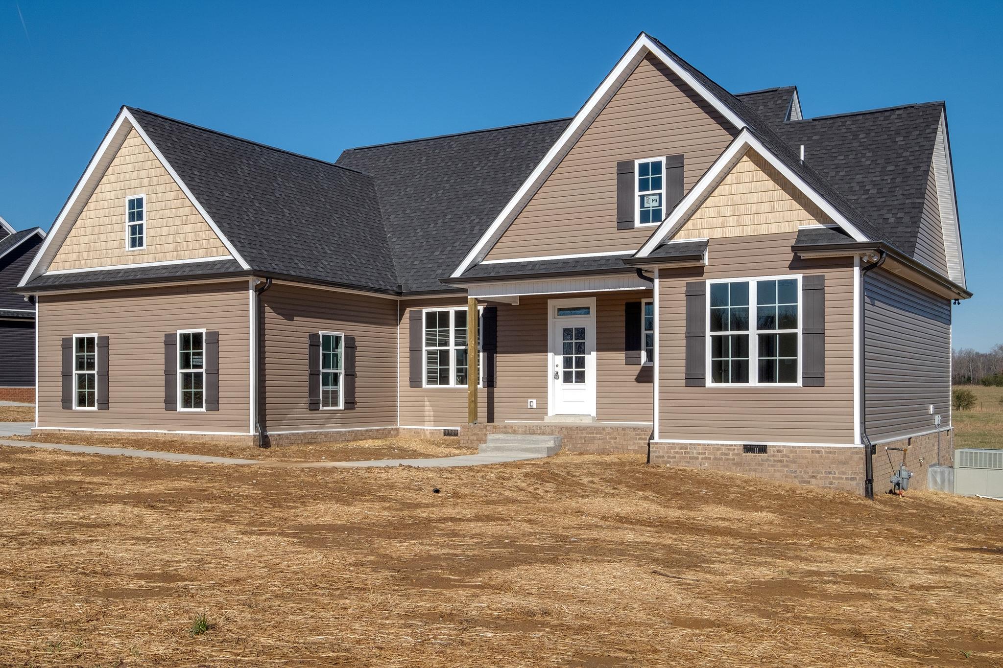1809 Abiff Road Burns, TN 37029 - Photo 27 of 28 a front view of a house with a yard