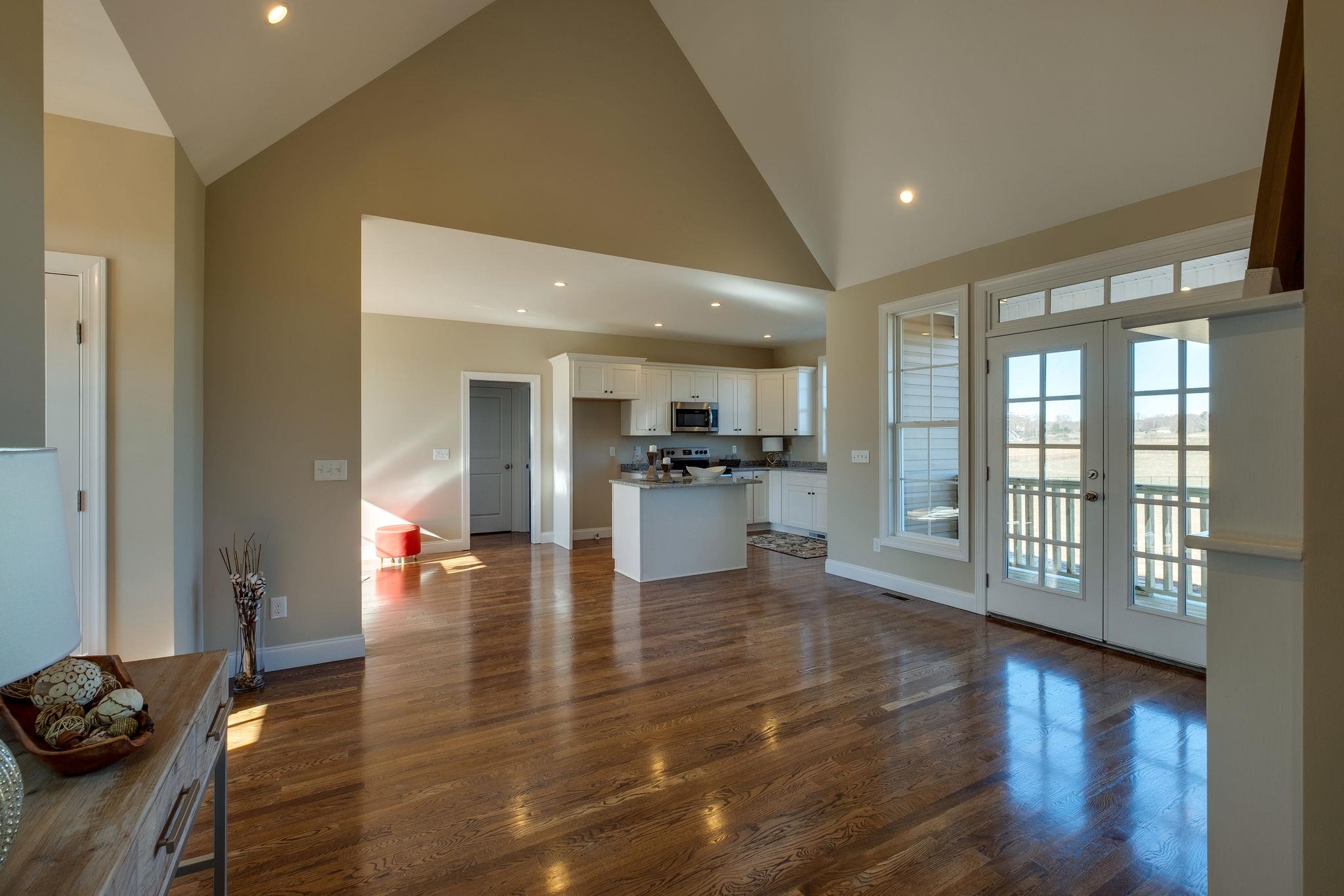 1809 Abiff Road Burns, TN 37029 - Photo 28 of 28 a view of a big room with wooden floor and windows