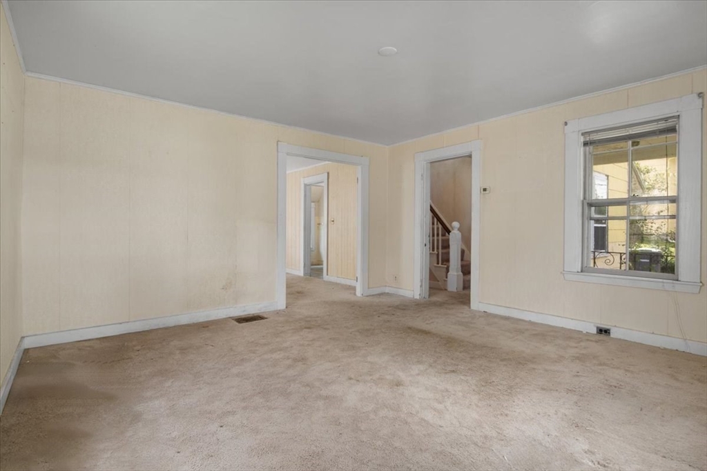 50 Clark Street Dedham, MA 02026 - Photo 13 of 38 a view of an empty room with a window