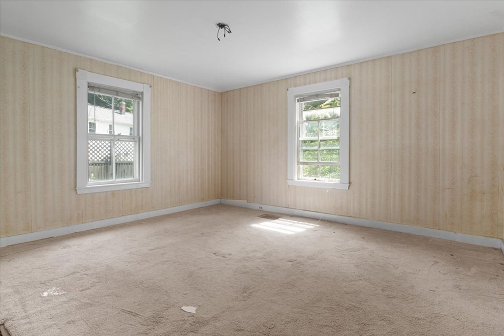 50 Clark Street Dedham, MA 02026 - Photo 14 of 38 a view of an empty room with a window