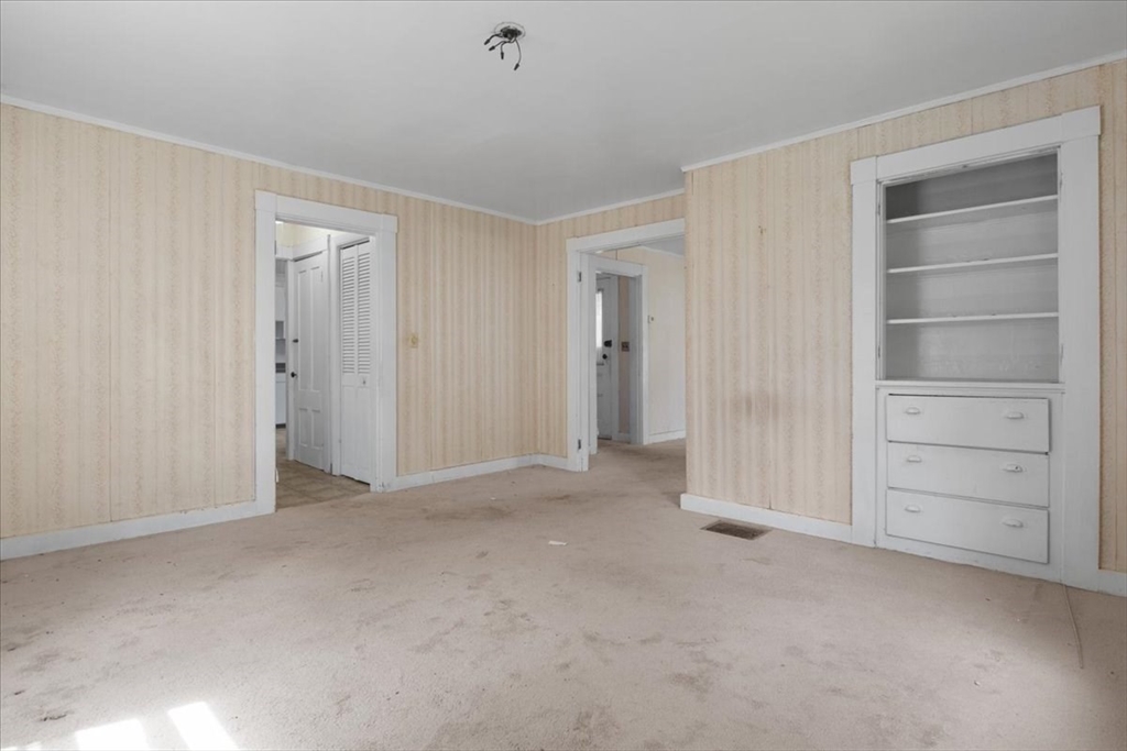 50 Clark Street Dedham, MA 02026 - Photo 16 of 38 a view of an empty room and closet area