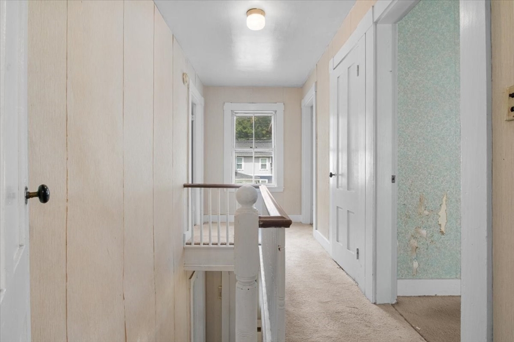 50 Clark Street Dedham, MA 02026 - Photo 18 of 38 a view of entryway with wooden floor