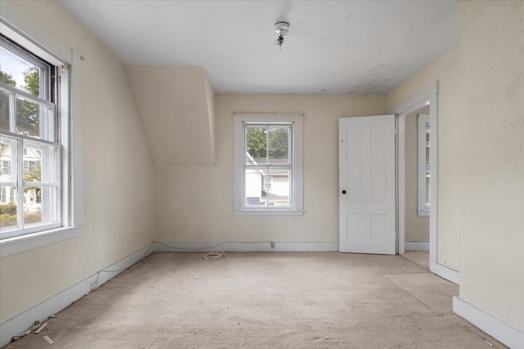 50 Clark Street Dedham, MA 02026 - Photo 21 of 38 an empty room with windows