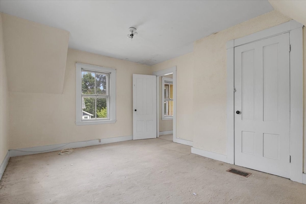 50 Clark Street Dedham, MA 02026 - Photo 22 of 38 an empty room with windows